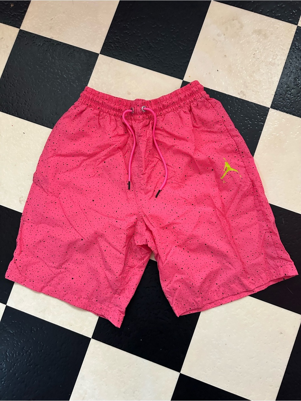 Jordan Men’s Pink Swim Trunks with Yellow Jumpman